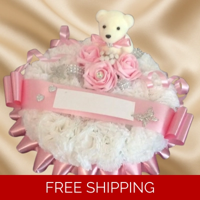 Pink funeral teddy bear posy tribute -